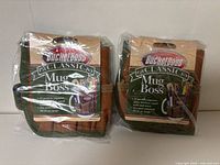 Both packaged Bucket Boss Classic Mug Boss organizers front view