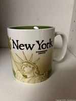 Front view showing New York text, Statue of Liberty graphic