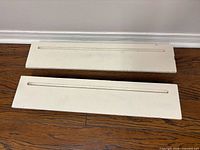 Both shelves front view on floor