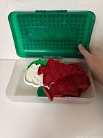 Cookie cutters inside green pencil case