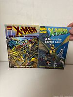 Front covers of both X-Men paperback comics