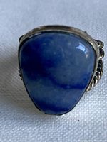 Front view of sterling silver ring showing blue aventurine cabochon