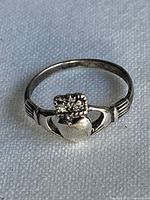 Front view of sterling silver Claddagh ring