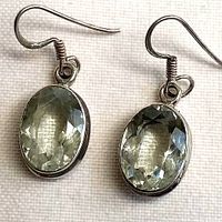 Front view of both earrings showing stones and settings