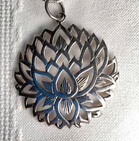 Front view of sterling silver lotus flower pendant