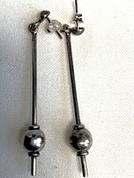 Front view of both sterling silver dangle earrings