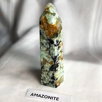 Front view of amazonite crystal point