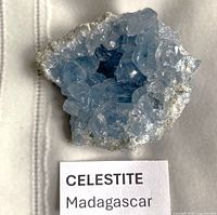 Front view of blue celestite cluster showing crystals