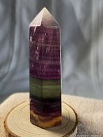 Full view of fluorite tower showing banded colors and polish