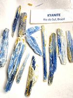 All kyanite blades arranged with label showing origin