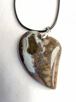 Front view of pendant showing stone pattern and silver bale