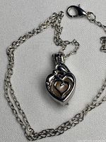 Necklace laid out showing pendant and chain