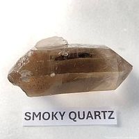 Oblique view of smoky quartz point showing color and form