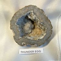 Front view of thunder egg showing quartz cavity