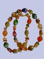 Entire necklace coiled to show full strand and bead variety