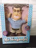 Front of boxed Mr. Wonderful talking doll