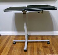 Full front view of rolling laptop table on casters