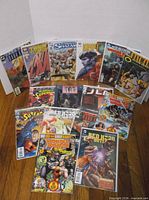 All comics standing and laid out to show quantity and titles