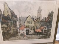 Close view of lithograph image showing European street scene