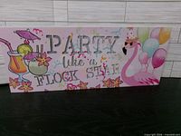 Front view showing full design, flamingo, cocktails, balloons and text
