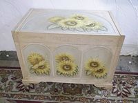 Front view showing sunflower panels and overall form