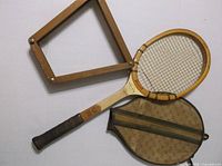 Full view of racket, press and cover