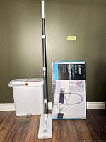 Full view of JoyBoss mop set with bucket and sealed Danze faucet box