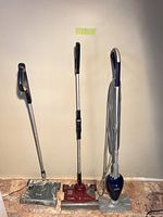 Three Shark powerheads standing upright showing full view and colors