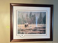 Front view of framed print on wall