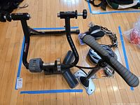 Blackburn TrakStand trainer with pump, saddle, locks and helmet grouped