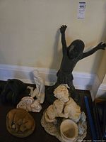 Group shot of all six statues