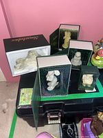 Overview of five boxed Department 56 Snowbabies figurines