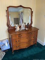 Front view dresser with attached mirror