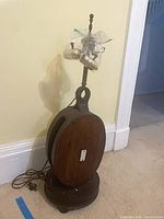 Full view of pulley lamp base with column and bagged parts