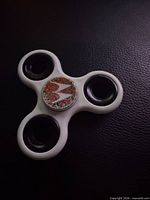 Front view showing Motorola logo sticker and black bearing caps