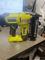 Left side view of Ryobi AirStrike 18V cordless brad nailer