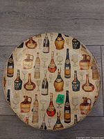 Front view showing full liquor bottle and glass pattern