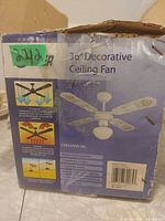 Box front showing Super brand 36" Decorative Ceiling Fan model CKB36MW-ML and feature list