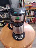 Front view of Black & Decker coffee maker showing carafe and control panel