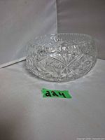 Side view of clear crystal bowl showing pinwheel cuts