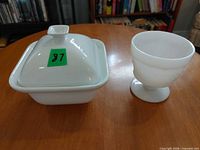 Covered dish and goblet side by side