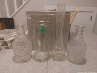 Group view of two vases and two decanters