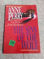 Front cover showing title, author, publisher logo, inventory sticker