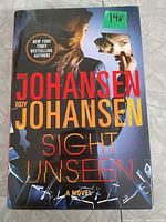 Front cover showing title, authors and dust jacket