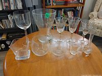 Group shot of all ten glass pieces on table