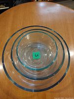 Top view of three nested clear glass mixing bowls