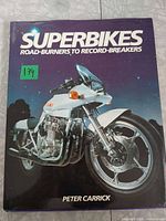 Front cover of the book showing title, author and motorcycle image