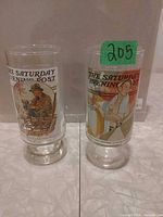 front view of both printed glasses showing cover art