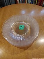 Stack of pink crystal plates side view showing colour and pattern