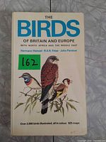 Front cover showing title, authors and bird illustrations